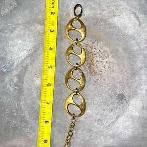 Gold-toned chunky bracelet.